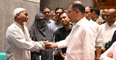 PM embraces grief of July fighters, martyrs' families; vows support