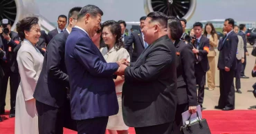 Xi, Kim pledge closer China-North Korea ties