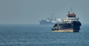 Iran warns the US against attacks on its vessels as fragile ceasefire holds