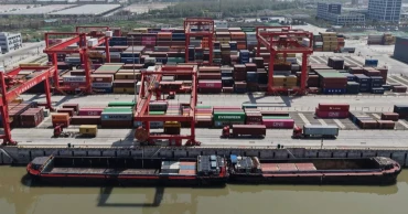 China vows to fight after Trump threatens more tariffs