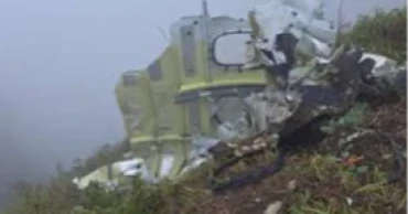 Indonesian rescuers recover body, plane wreckage in Sulawesi mountains