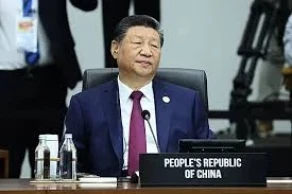 Xi vows to defend free trade at APEC as Trump skips key summit