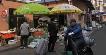 Consumer prices fell in China in February, remain flat in sluggish economy