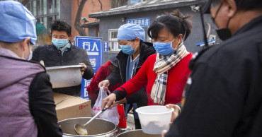 China's leaders say nation yet to turn corner in virus fight