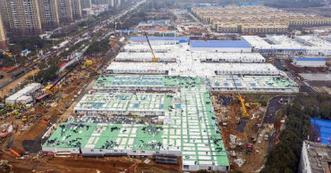 Built in 10 days, China's virus hospital takes 1st patients
