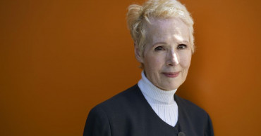 Trump lawyers want columnist's defamation suit to be tossed