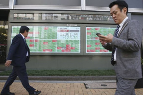 World shares advance despite new US-China trade jitters