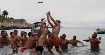 Seeking the cross: Icy dips mark the feast of Epiphany