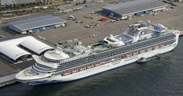 Cruise ship turned away as virus alarm doctor dies in China