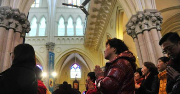 China pressuring priest at center of agreement with Vatican