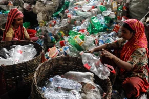 Workers Busy Recycling Plastic in Kamrangirchar