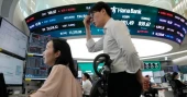 Asian markets fall as South Korean stocks tumble despite Wall Street's AI-driven rally