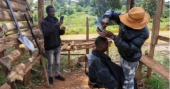 Kenyan barber wields shovel to carve social media fame