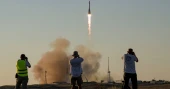 US-Russian crew reaches International Space Station for eight-month mission