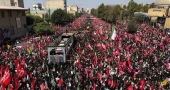 Tanker hit by projectile in Strait of Hormuz as Iran holds funeral for Khamenei