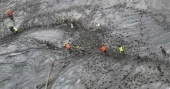 2 workers rescued alive from Nepal hydropower tunnel as search continues for others