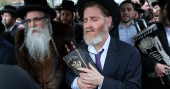 Security tight, Jews gather at stadium for religious event