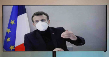 Virus-stricken Macron at presidential retreat with fever