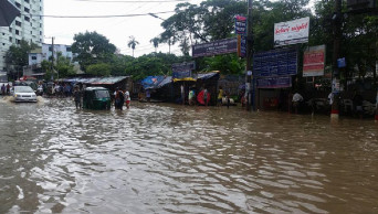 Commuters suffer as city roads go under rainwater    