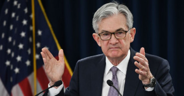 U.S. Fed says current monetary policy appropriate as downside risks recede