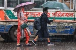 Rain brings much needed relief, disrupts rush hour commute in Dhaka