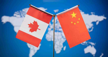 Chinese, Canadian FMs hold talks over phone