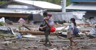 Nearly 100 dead, dozens missing as storm lashes Philippines