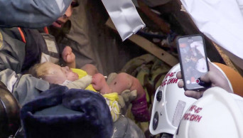 Russian baby rescued after nearly 36 hours in frozen rubble
