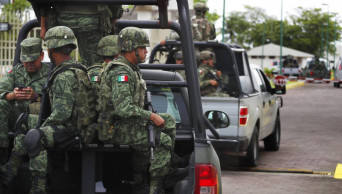 Mexico says Guard deployment beginning, forms migrant team