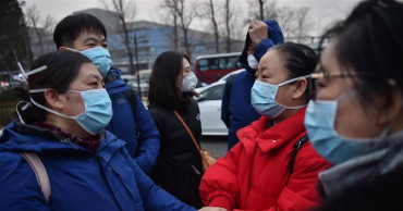 Wuhan hospitals receive over 15,000 fever patients daily