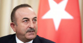 Turkey's FM urges Russia to halt Syrian government attacks