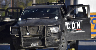 Toll at least 21 after Mexico cartel attack near US border