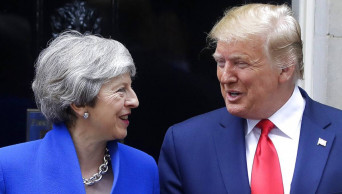 Trump eases up, makes nice with May before she steps down