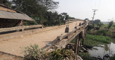 Dilapidated bridge stands in danger