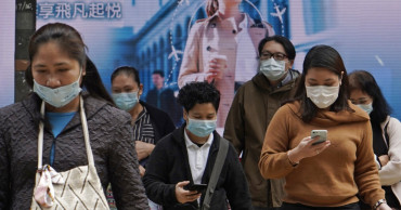 China still mostly closed down as virus deaths pass 1,000