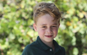 With a wide smile for mom, Britain's Prince George turns 6