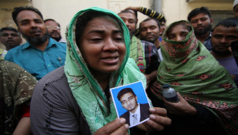 Relatives throng DMCH, photos in hand but no hope in their hearts
