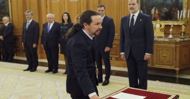 Spain's new coalition government Cabinet members take oaths