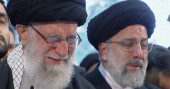 Weeping, Iran supreme leader prays over general slain by US