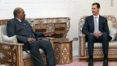 Sudan president lands in Syria in 1st visit by Arab leader