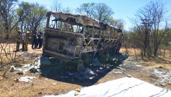 Passengers in Zimbabwe caught in bus fire; 40 killed