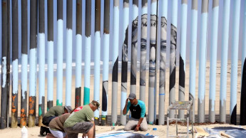 Interactive border wall mural tells stories of deported
