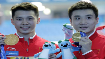Chinese diver Chen wins 3rd world title in 10-meter synchro