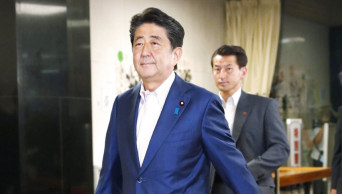 Exit polls: Japan's ruling bloc secures upper house majority