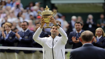 Djokovic bests Federer in 5th-set tiebreaker at Wimbledon