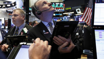 US stocks eke out gains after bumpy day caps solid week