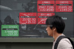 Asian shares mixed amid uncertainties on Brexit, China trade