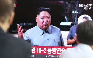N. Korea fires missiles into sea in apparent pressure tactic