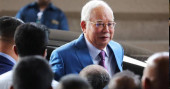 Former Malaysian PM Najib takes witness stand on corruption charges related to 1MDB case