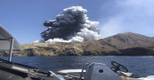 New Zealand volcano vents steam, stymies recovery of bodies